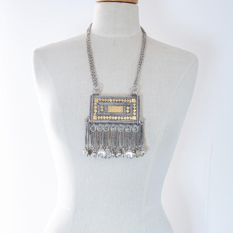 Omani silver Hirz amulet necklace shown worn